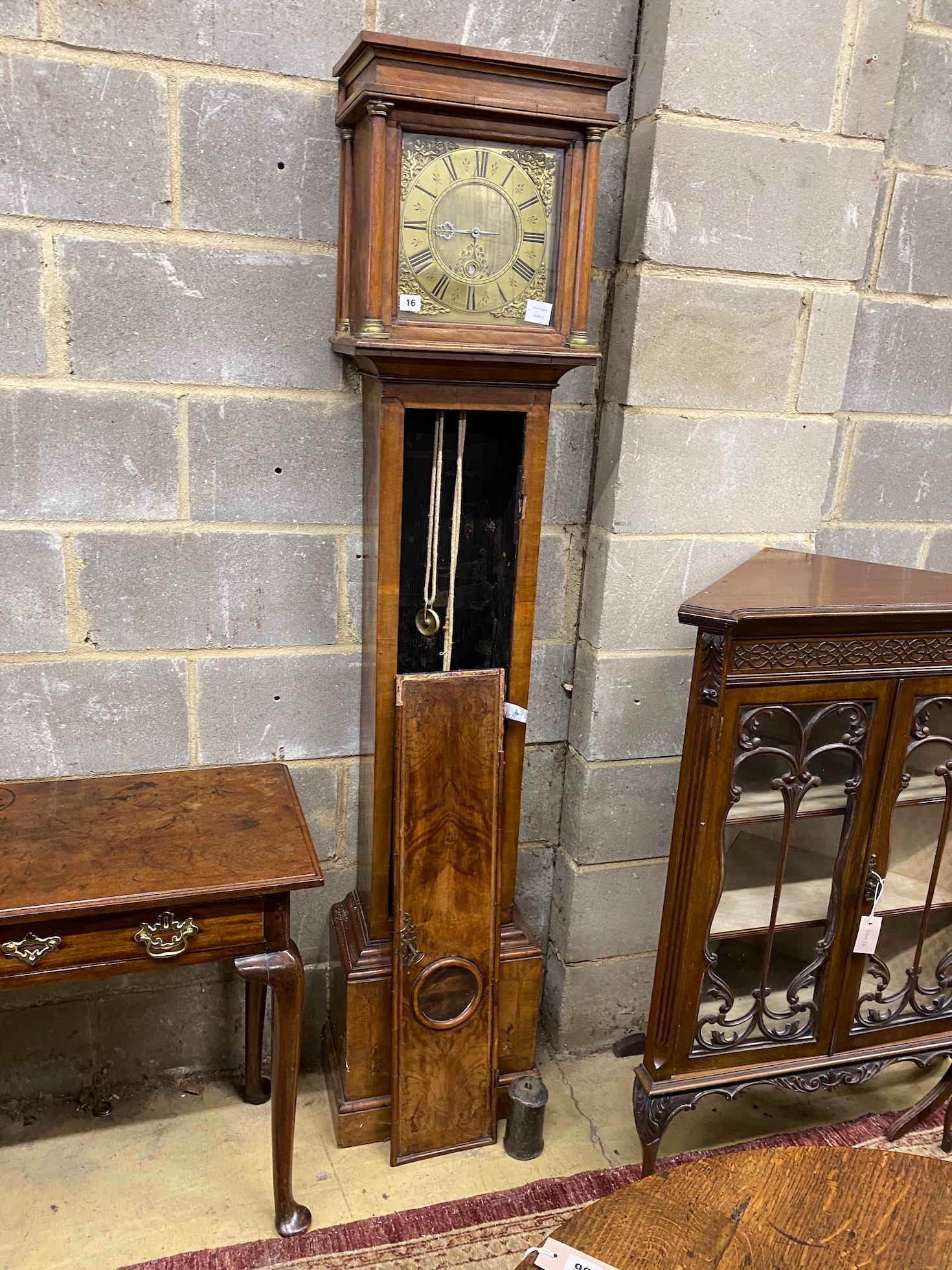 An 18th century walnut thirty hour longcase clock, the 10 inch square brass dial marked Sam Hammond, Battell, height 185cm